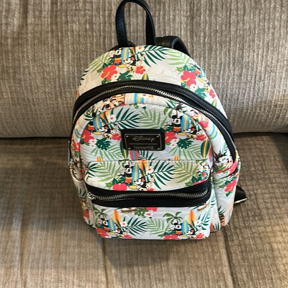 Disney’s making a mini tropical surfboard lounge fly backpack 10 1/2 x 9 - Picture 3 of 10
